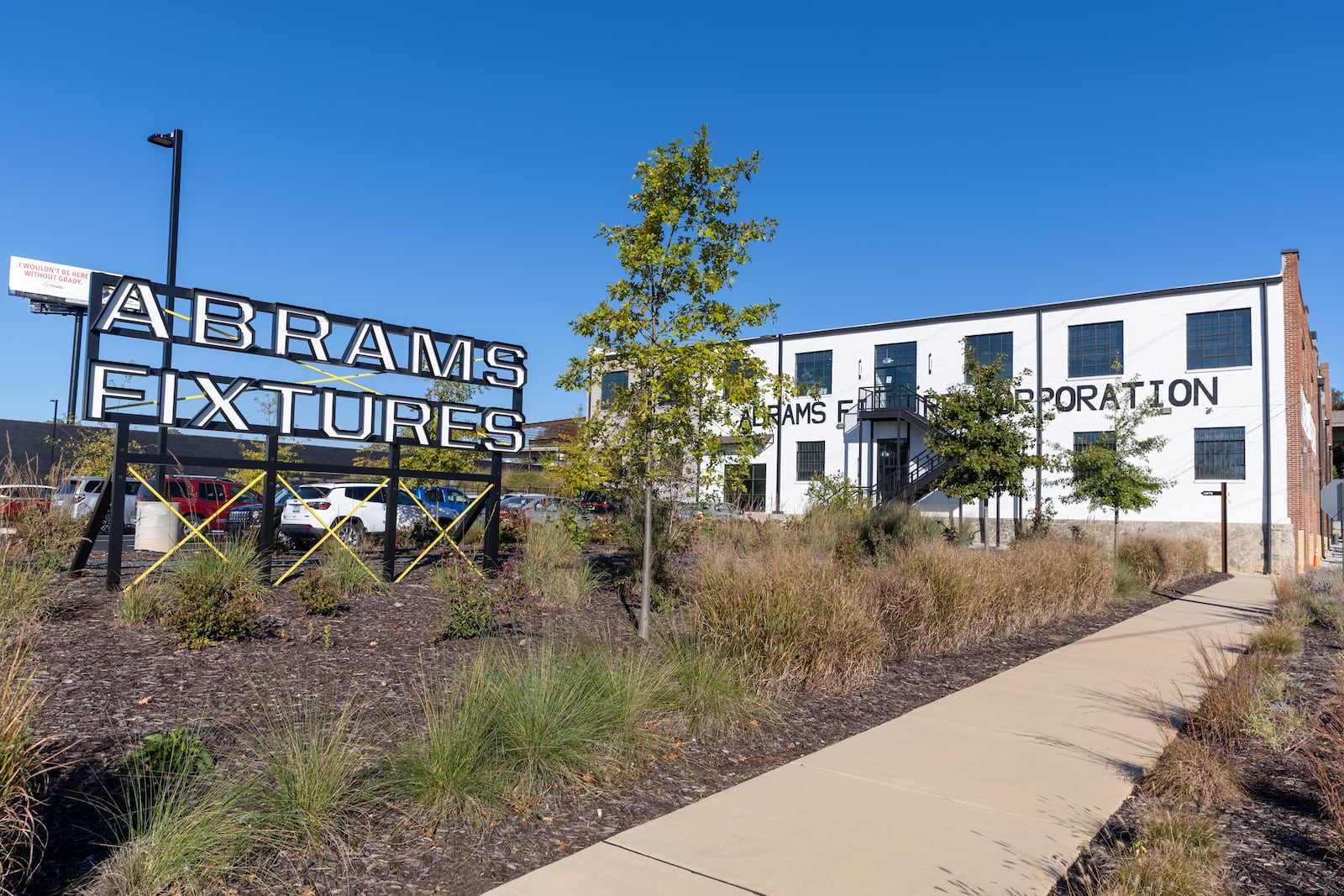 Abrams Fixtures is seen in Atlanta on Wednesday, October 16, 2024. The industrial building that housed several companies since 1920 was converted in 2019 into 33 residential lofts, 50,000 square feet of office space and about 8,000 square feet of restaurant space. (Arvin Temkar / AJC)