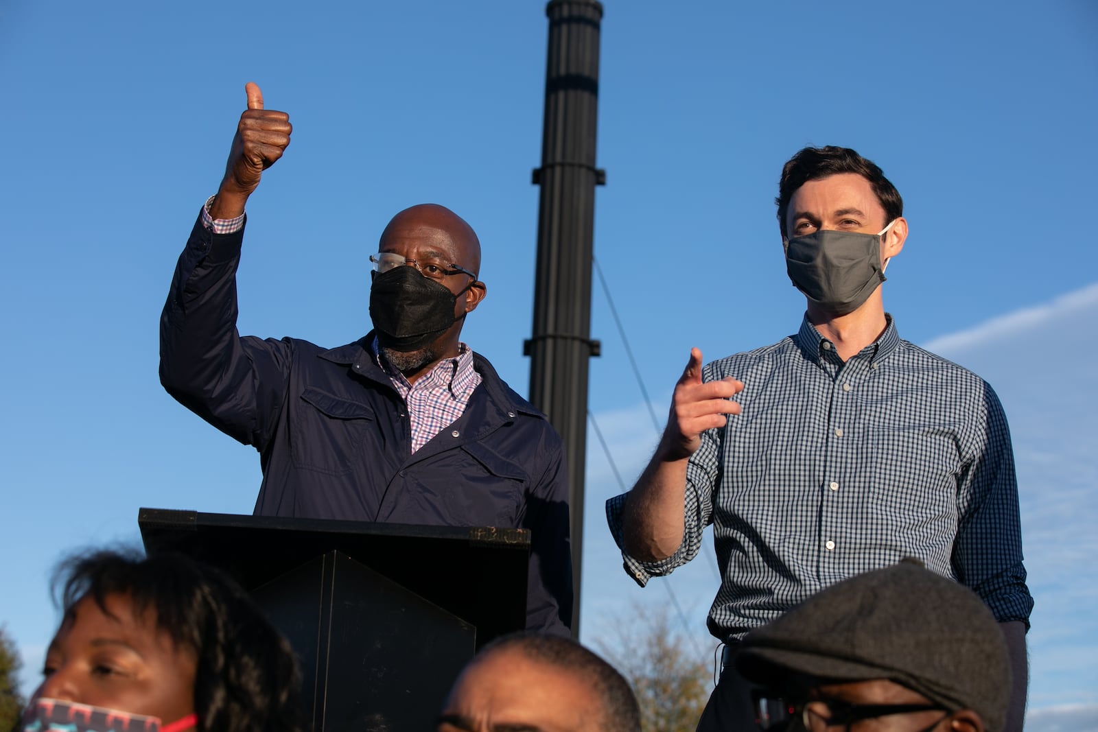 Democratic U.S. Senate candidates Jon Ossoff (R) and Raphael Warnock (L) of Georgia hold a rally on November 15, 2020 in Marietta, Georgia. Ossoff and Warnock face incumbent U.S. Sens. David Purdue (R-GA) and Kelly Loeffler (R-GA) respectively in a January 5 runoff election. (Jessica McGowan/Getty Images/TNS)