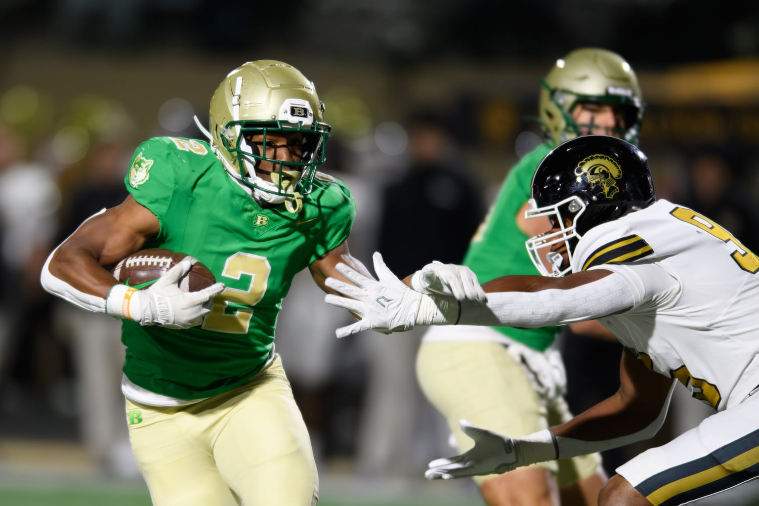 Buford's Justin Baker carries the ball. (Jamie Spaar for the Atlanta Journal Constitution)