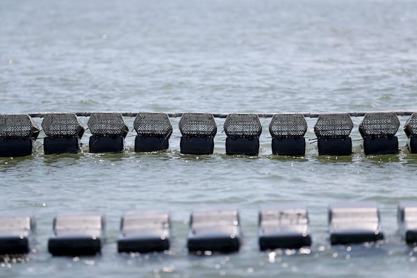 Some of the Flip Farm cages currently not in use are out of the water to bleach away aby algae and barnacle growth.