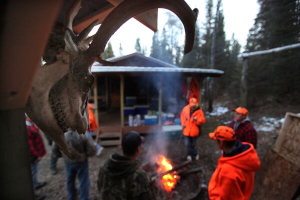 Georgia law requires hunters to wear an outer garment, such as a shirt or head covering, that is 500 square inches of “daylight fluorescent orange” above the waist when hunting.