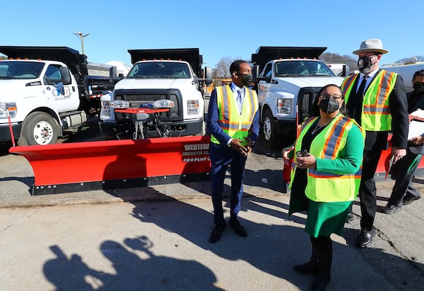 012722 Atlanta:  Atlanta Mayor Andre Dickens (from left),  Congresswoman Nikema Williams and Atlanta Department of Transportation Commissioner Josh Rowan tour the ATLDOT North Avenue facility following a press briefing on how the Infrastructure Investment and Jobs Act will invest in Atlanta’s infrastructure on Thursday, Jan. 27, 2022, in Atlanta.   “Curtis Compton / Curtis.Compton@ajc.com”`