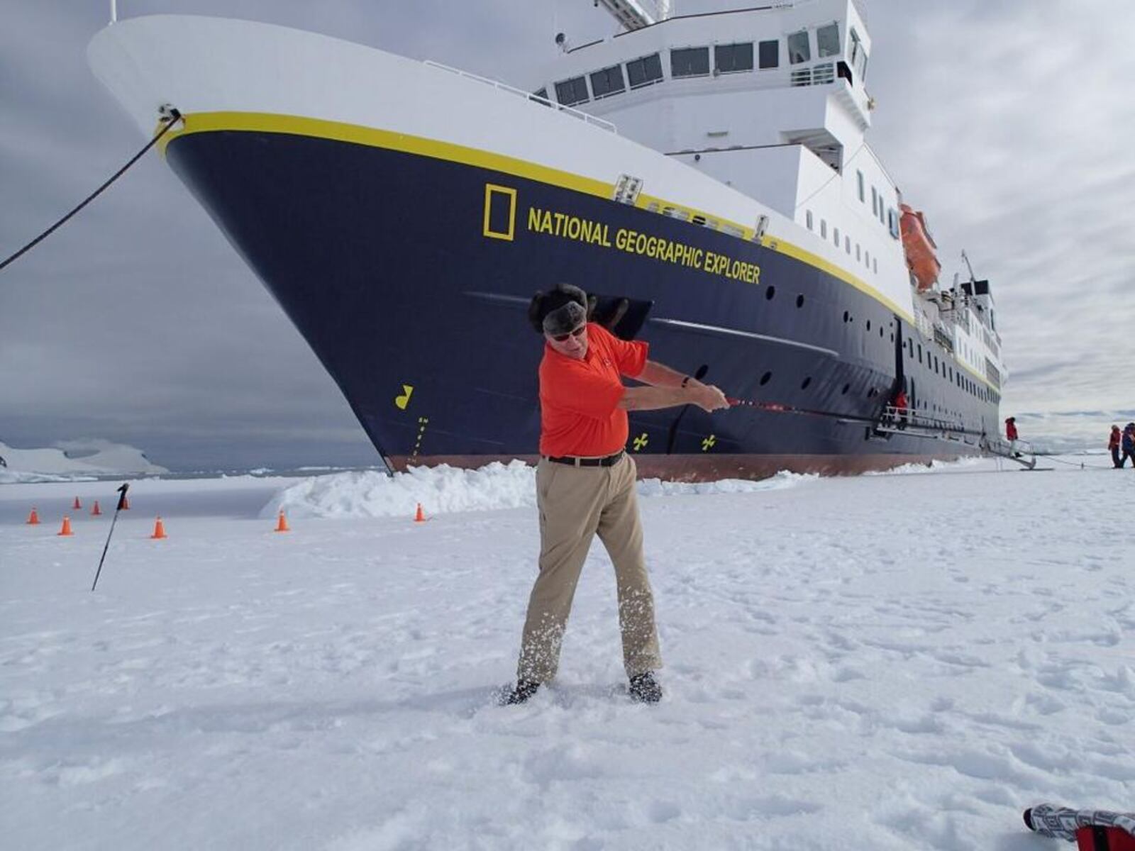 Neal Boortz tries out his golf swing in Antarctica. CREDIT: WSB Radio