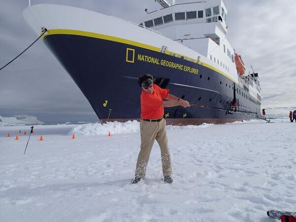 Neal Boortz tries out his golf swing in Antarctica. CREDIT: WSB Radio