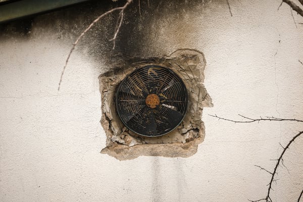 A charred ventilator on the wall of a nightclub building, damaged following a massive fire early Sunday in the town of Kocani, North Macedonia, Monday, March 17, 2025, (AP Photo/Armin Durgut)