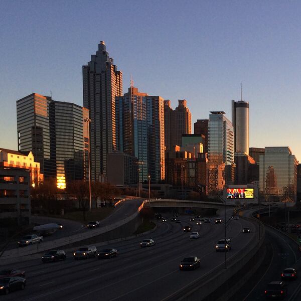 The Downtown skyline glows with the last rays of the setting sun. Ben Gray / @photobgray