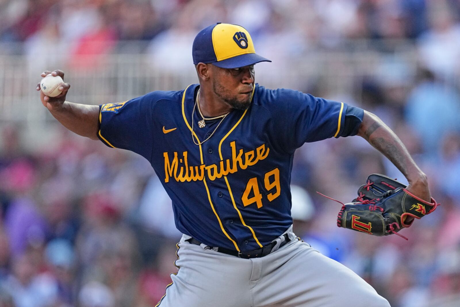 Milwaukee Brewers starting pitcher Julio Teheran delivers to an Atlanta Braves batter during the first inning of a baseball game Saturday, July 29, 2023, in Atlanta. (AP Photo/John Bazemore)