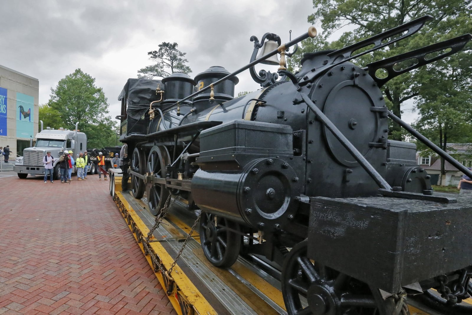 After being refurbished at the North Carolina Transportation Museum, the 26-ton Texas, an 1860s-era steam locomotive, was hauled Thursday to the front yard of the Atlanta History Center, where it will be part of that center’s enormous Civil War collection. BOB ANDRES / BANDRES@AJC.COM