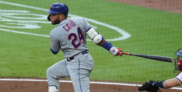 Robinson Cano bats for the Mets during a 2020 game against the Braves.