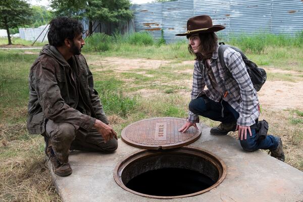  Chandler Riggs as Carl Grimes, Avi Nash as Siddiq - The Walking Dead _ Season 8, Episode 9 - Photo Credit: Gene Page/AMC