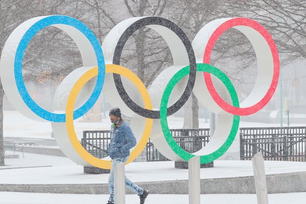 The Olympic rings at Centennial Park still look good in white. 