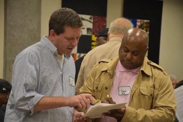 First “Come Meet a Black Person” event attendees talk throughout the evening. The event was the brainchild of Cheryle Moses of Lawrenceville. Contributed