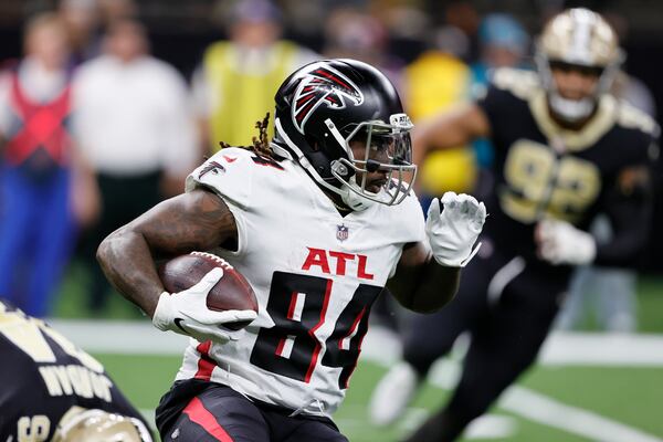 Atlanta Falcons running back Cordarrelle Patterson (84) runs against the New Orleans Saints during the first half of an NFL football game, Sunday, Nov. 7, 2021, in New Orleans. (AP Photo/Butch Dill)