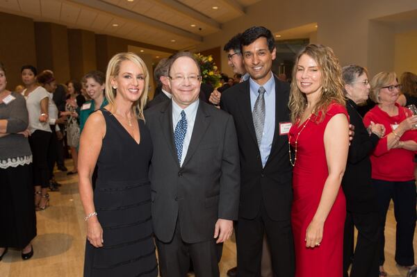 Louise and Brett Samsky share a moment with Dr. Vivek Rajagopal, and his wife, Dr. Melissa Babcock, on the night Brett Samsky announced the family’s first gift of $6 million to create the Samsky Advanced Heart Failure Center at Piedmont Atlanta Hospital. CONTRIBUTED