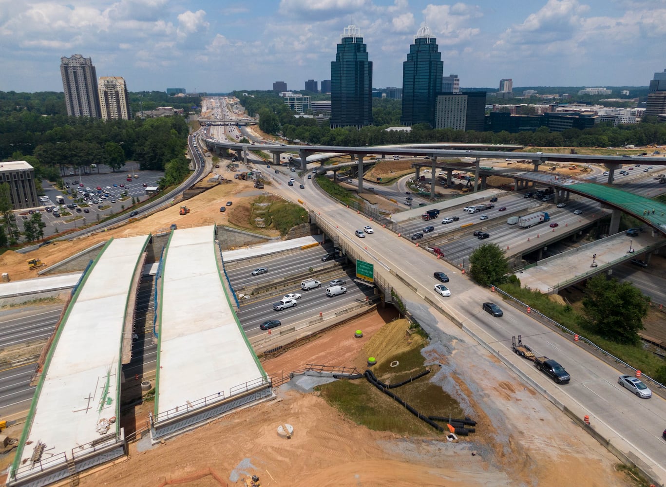 May 27, 2021 Sandy Springs - Aerial photo shows construction site of I-285 interchange at Ga. 400 in Sandy Springs on Tuesday, May 27, 2021. (Hyosub Shin / Hyosub.Shin@ajc.com)