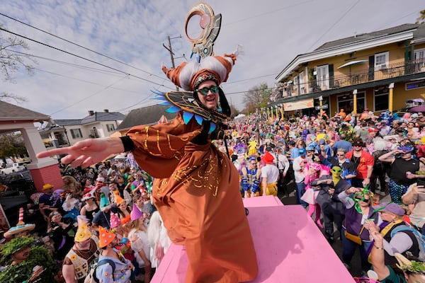 People gather for the start of the Society of Saint Anne's parade on Mardi Gras Day, Tuesday, March 4, 2025 in New Orleans. (AP Photo/Gerald Herbert) (AP Photo/Gerald Herbert)