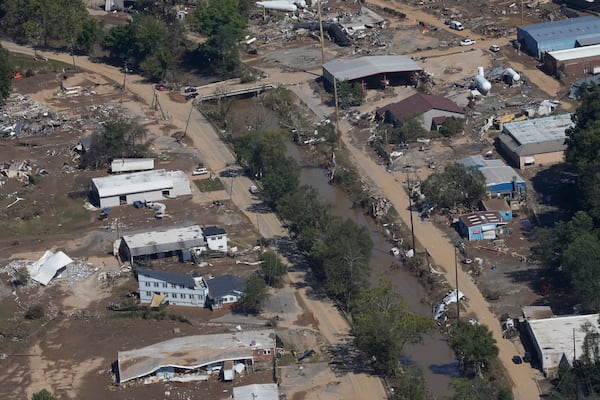 FILE - Damage from Hurricane Helene near Asheville, N.C., is seen during an aerial tour for President Joe Biden, Oct. 2, 2024. (AP Photo/Susan Walsh, File)