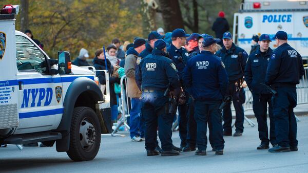 NYPD police offers patrol the parade route at the 91st Macy's Thanksgiving Day Parade on Thursday, Nov. 23, 2017, in New York. (Photo by Scott Roth/Invision/AP)