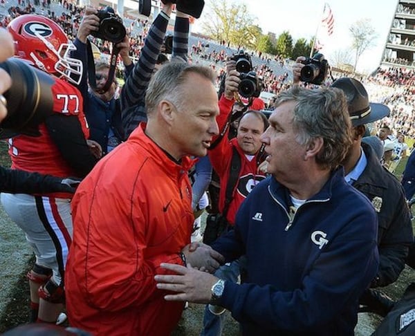 "Good luck in your title game, Paul." "You, too, Mark." (Brant Sanderlin/AJC photo)