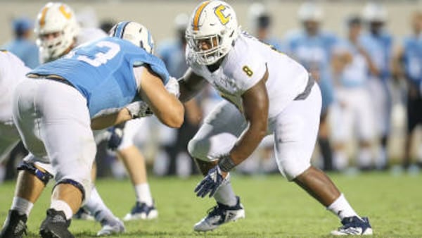 Former Northwest Whitfield player Isaiah Mack (right) was the Southern Conference defensive player of the year in 2018 for  Chattanooga.