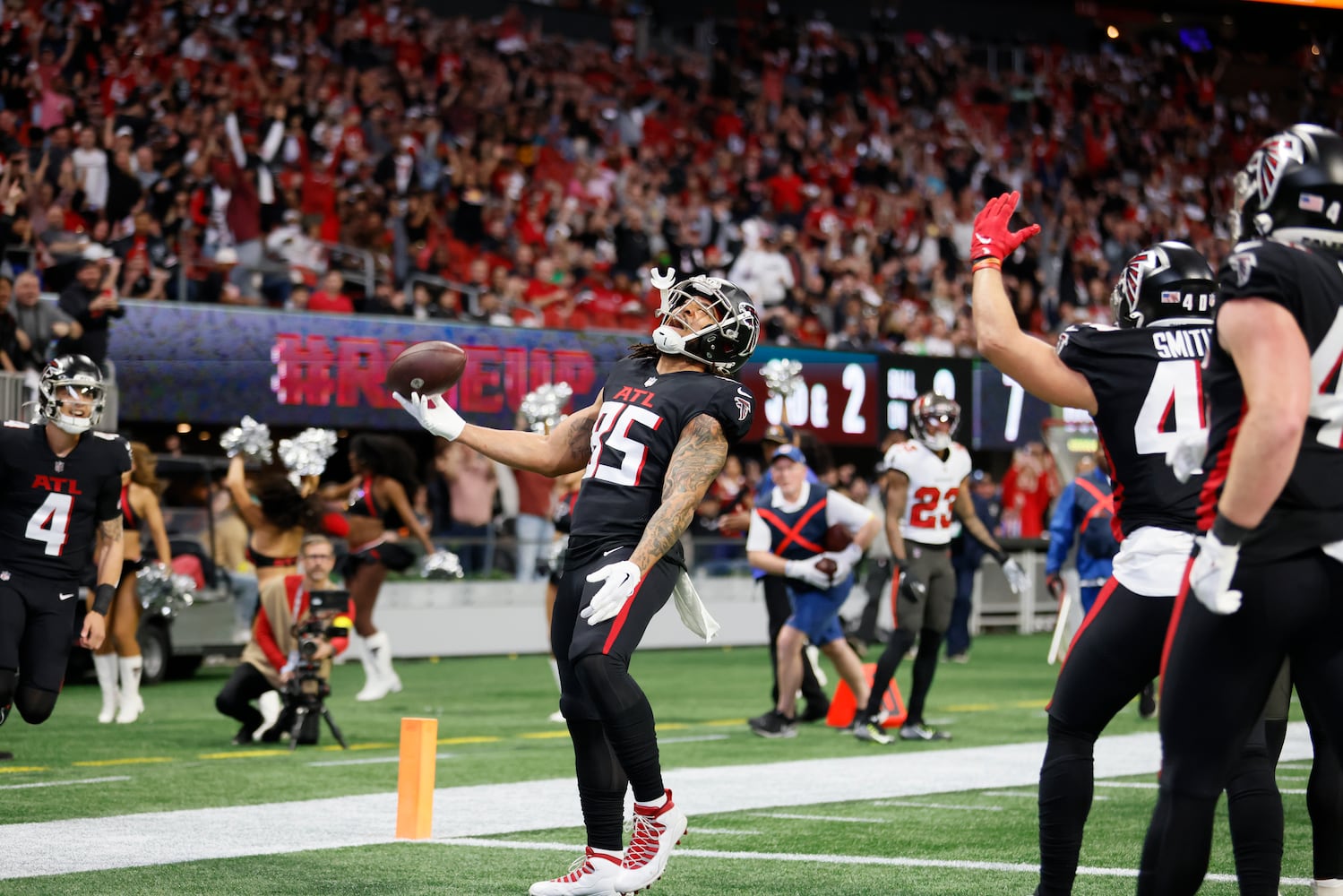 Falcons tight end MyCole Pruitt reacts after scoring a touchdown during the first quarter Sunday in Atlanta. (Miguel Martinez / miguel.martinezjimenez@ajc.com)