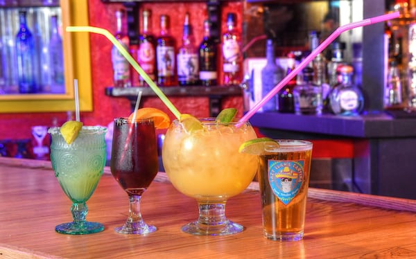 L-R: Llama-Rita, Sangria Roja, Dolly Llama's Texas Margarita Fish Bowl Size, Dos XX Lager. CONTRIBUTED BY CHRIS HUNT PHOTOGRAPHY