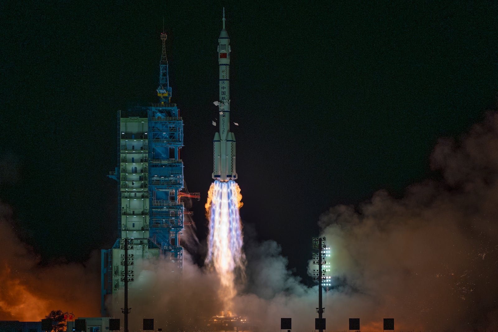 Shenzhou-19 spacecraft sitting atop a Long March rocket takes off from the Jiuquan Satellite Launch Center in Jiuquan, northwestern China in the early hours of Wednesday, Oct. 30, 2024. (AP Photo/Ng Han Guan)