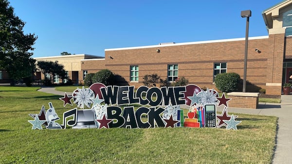 Lovinggood Middle School students were welcomed back to class Tuesday with this sign in front of the school. (Alice Tecotzky/alice.tecotzky@ajc.com)