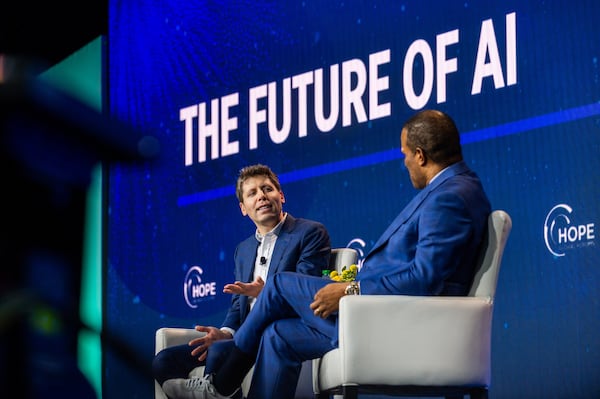 231211 ATLANTA, GA — From left, OpenAI CEO Sam Altman and founder and CEO of Operation HOPE John Hope Bryant speak at the HOPE Global Forums at the Hyatt Regency in downtown Atlanta on Monday, Dec. 11, 2023. 
(Bita Honarvar for The Atlanta Journal-Constitution)