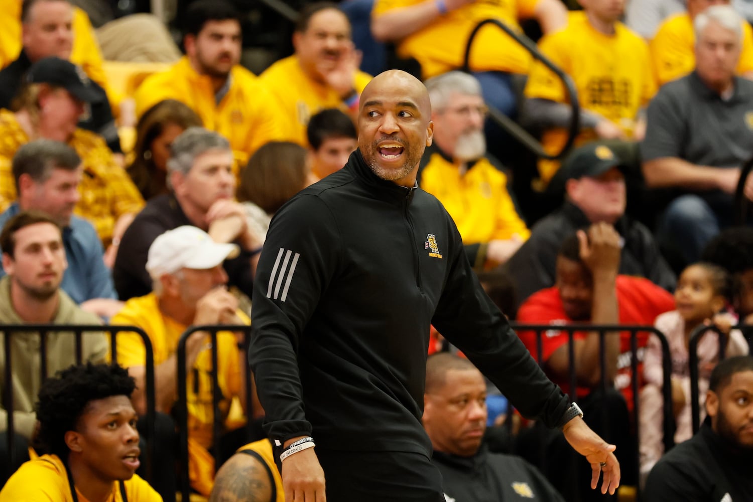 Kennesaw State Owls head coach Amir Abdur-Rahim reacts after a call during the second half against Liberty Flames at the Kennesaw State Convention Center on Thursday, Feb 16, 2023.
 Miguel Martinez / miguel.martinezjimenez@ajc.com