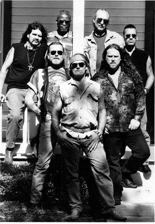 Allman Brothers band Clockwise from Bottom Center: Dickey Betts, Gregg Allman. Allen Woody, Jaimoe, Butch Trucks, Marc Quinones, Warren haynes. Photo credit Kirk West Epic records