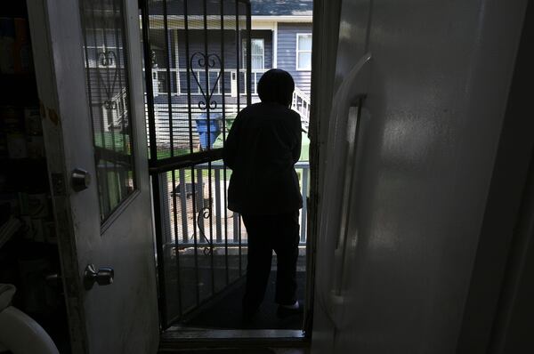 Sally Hollis shows her Habitat for Humanity home built in 1988 in Atlanta's Edgewood area by Jimmy and Rosalynn Carter and other volunteers. (Hyosub Shin / Hyosub.Shin@ajc.com)