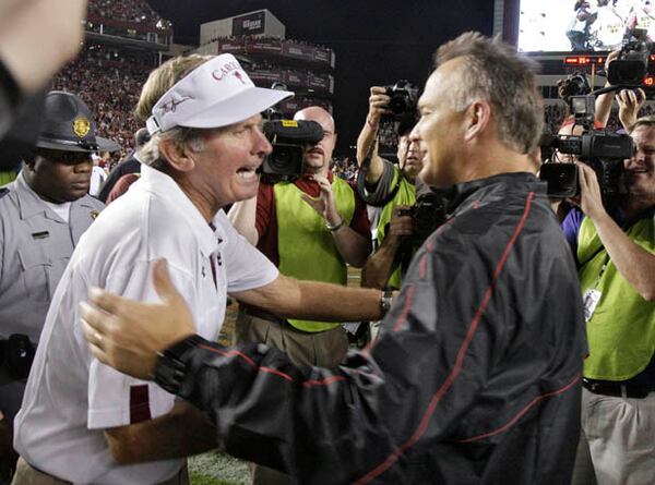 Oct. 6, 2012 - Columbia, SC - Coach Mark Richt congratulates Steve Spurrier after Georgia's 35-7 defeat. Georgia at South Carolina football. BOB ANDRES BANDRES@AJC.COM "That Saban's got some nerve, doesn't he?" (Bob Andres/AJC)