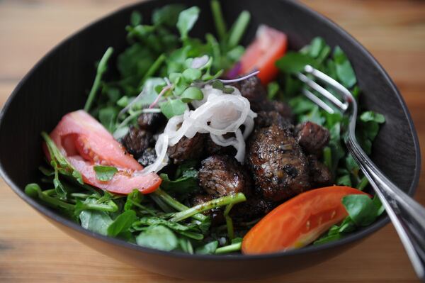 Bo Luc Lac Shaking Beef at Ba Bellies in Norcross. (BECKY STEIN PHOTOGRAPHY)