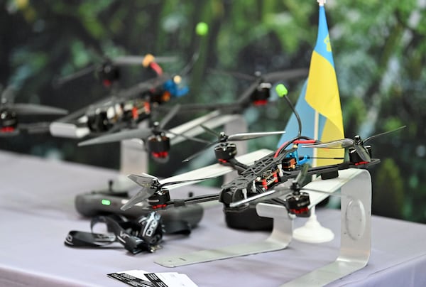 Drones manufactured by Futurology Tech are displayed during the Launch Pad Tech Collaboration Event hosted with Georgia Tech, Partnership Gwinnett and Peachtree Corners Curiosity Lab on Thursday in Norcross. Hyosub Shin/AJC