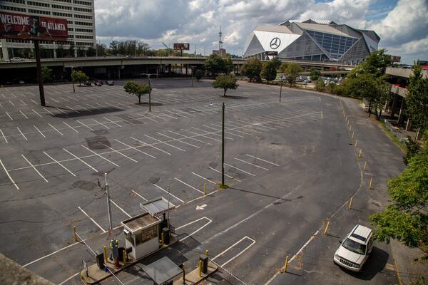 Developer CIM Group plans a $5 billion mix of office towers, apartments hotels and retail in downtown Atlanta’s Gulch. To do it, the company says it must construct a massive $500 million steel and concrete platform over the parking lots and rail beds to create a new street grid at the viaduct level. (Photo by Phil Skinner)