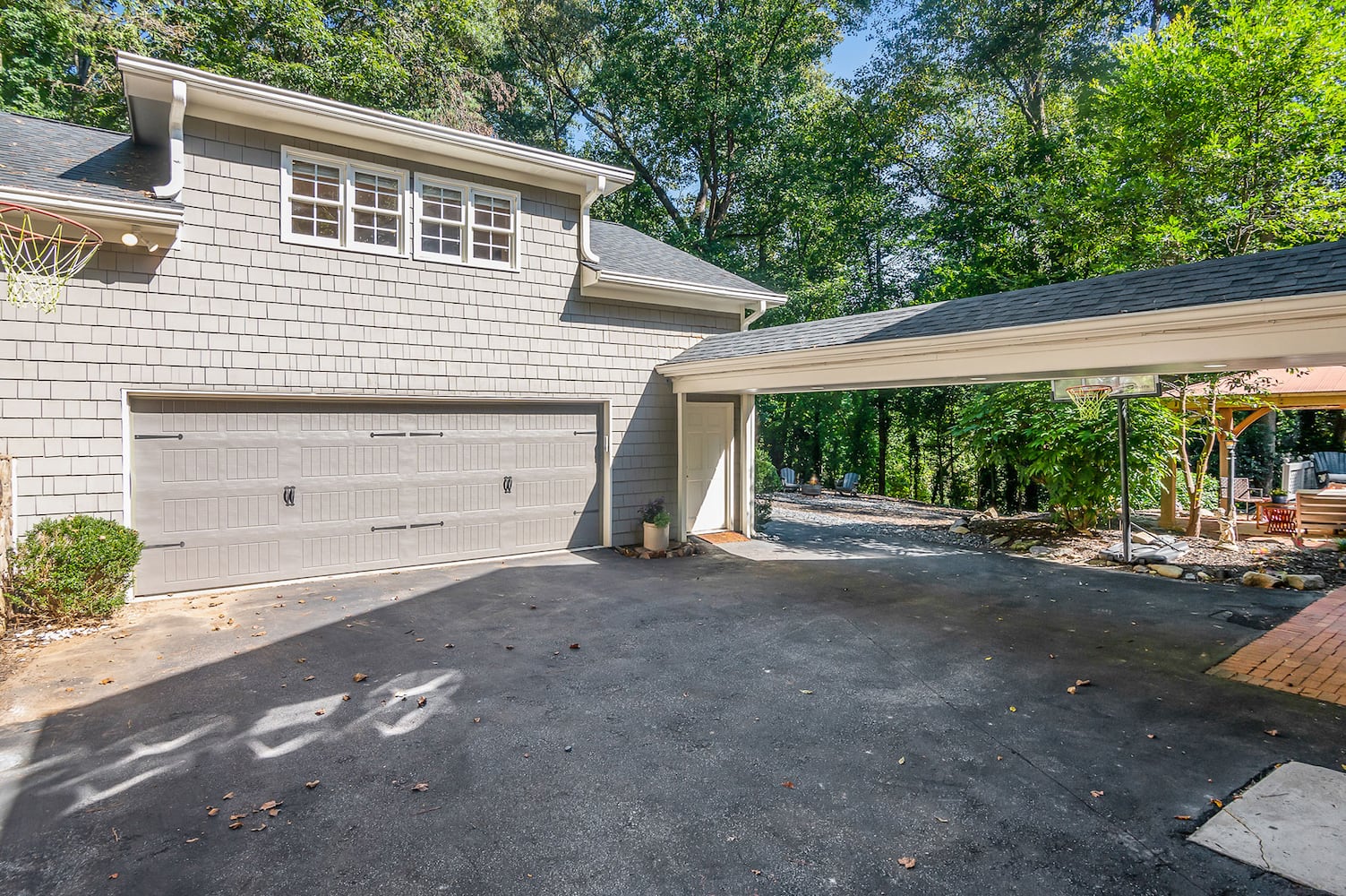 Photos: $1.2M gated Atlanta home features guest apartment, new fire pit