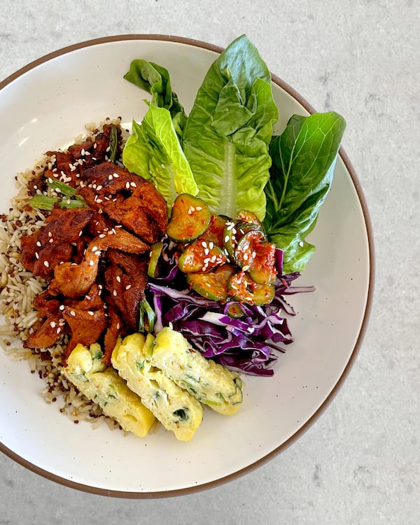 The jeyug bokkeum at Danbi Seasonal Kitchen featured Korean-style stir-fried pork and cucumber kimchi.