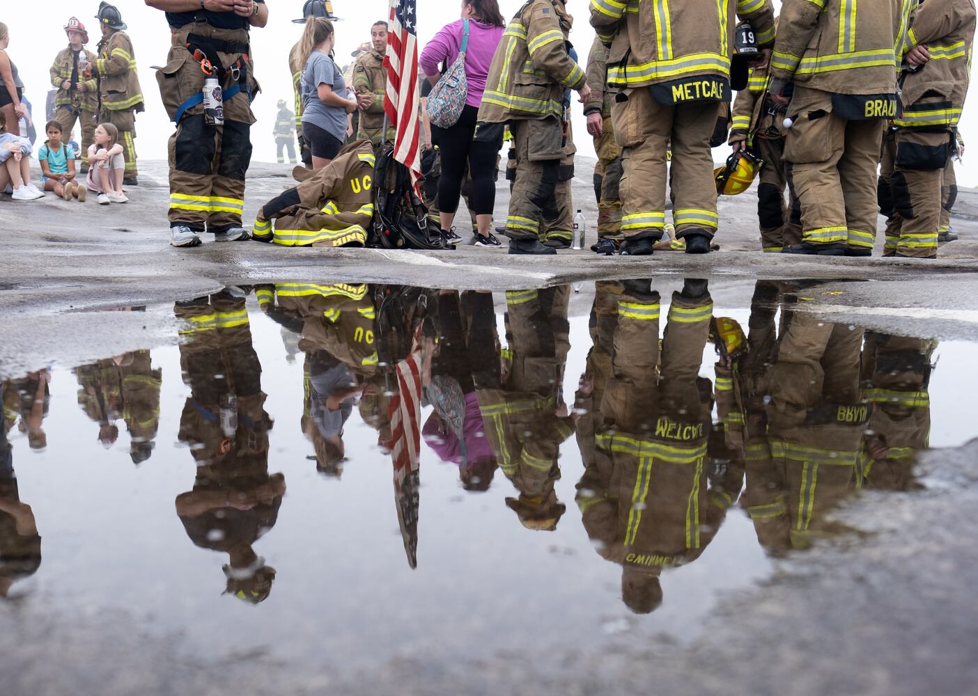 Firefighters gather after climbing Stone Mountain on Sunday morning, Sept. 11, 2022, during the annual remembrance of the 9/11 terrorist attacks. (Photo: Ben Gray for The Atlanta Journal-Constitution)