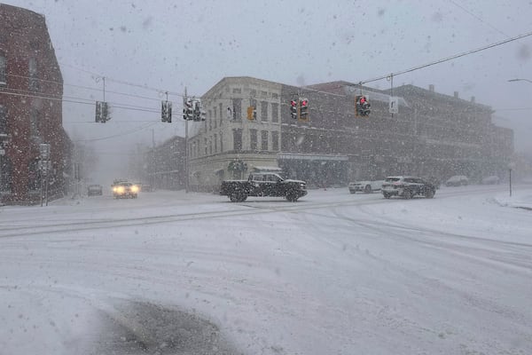 Fresh snow and high winds hit Lowville, N.Y., on Thursday, Dec. 12, 2024, as arts of the U.S. Northeast were in the grip of strong winter weather. (AP Photo/Cara Anna)