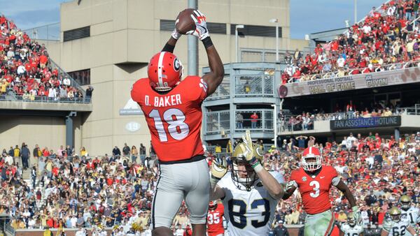 Georgia defensive back Deandre Baker (18) intercepts a pass intended for Georgia Tech wide receiver Brad Stewart (83) at Bobby Dodd Stadium on Saturday, November 25, 2017.