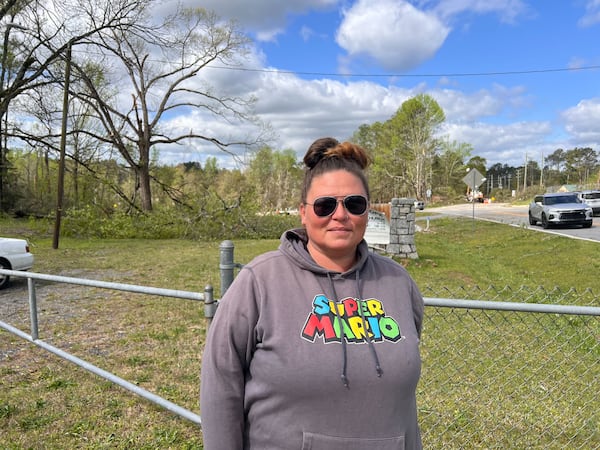 Amanda Little weathered a tornado at her home near Conyers just before midnight Tuesday.