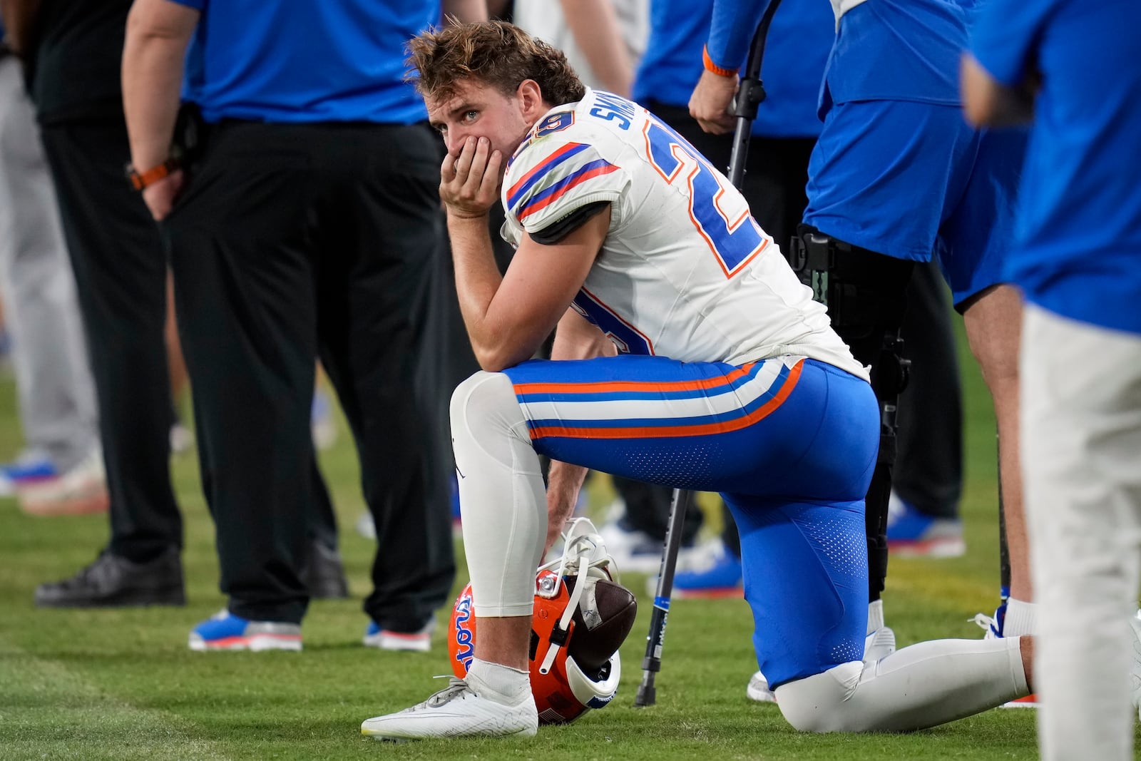 Florida place kicker Trey Smack watches the final moments of the second half of an NCAA college football game against Georgia, Saturday, Nov. 2, 2024, in Jacksonville, Fla. (AP Photo/John Raoux)