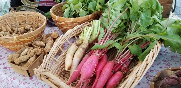 Each week, from March through December, farmers bring their produce to the farmers market in downtown East Point. All the produce is grown within 12 miles of the market. CONTRIBUTED BY ERIN RODGERS