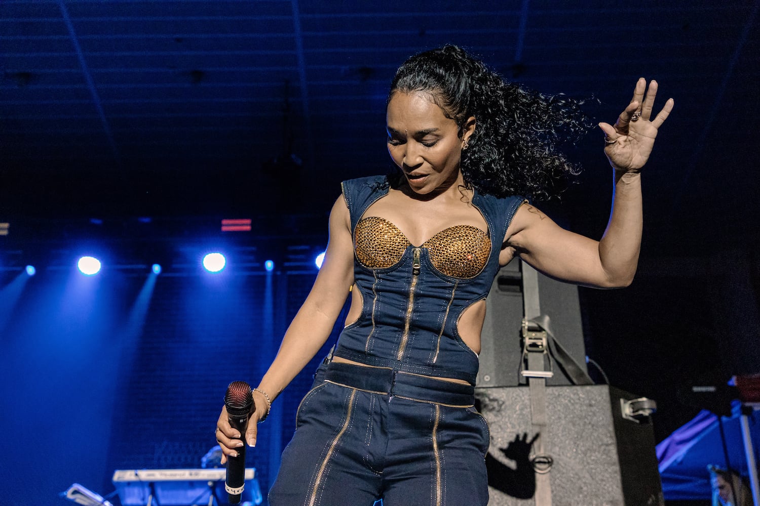 Rozonda "Chilli" Thomas dances during a TLC performance at the Stockbridge Amphitheater on Saturday, June 8, 2024. Credit: Kymani Culmer for the Atlanta Journal-Constitution