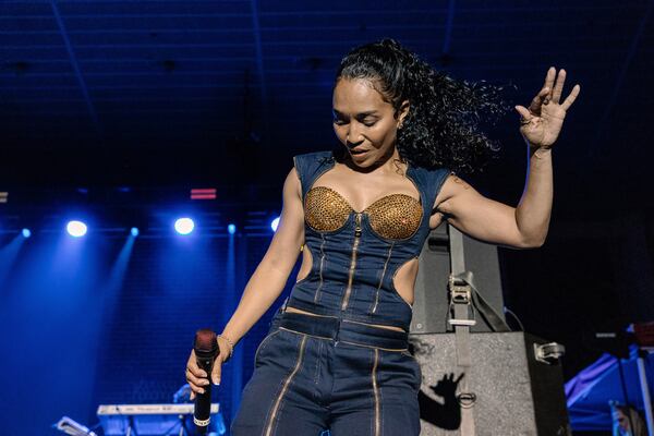 Rozonda "Chilli" Thomas dances during a TLC performance at the Stockbridge Amphitheater on Saturday. 