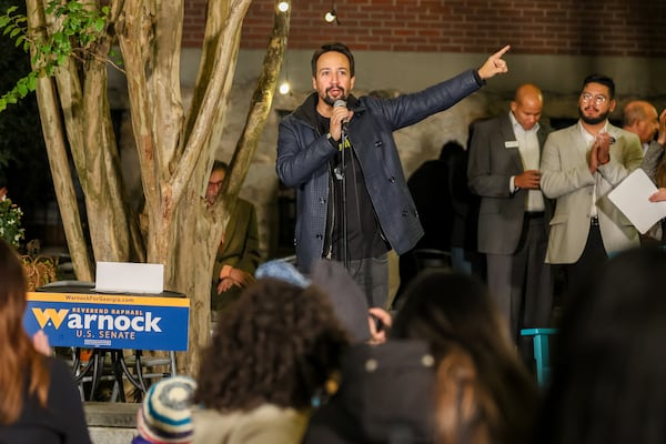 Lin-Manuel Miranda campaigns for U.S. Sen. Raphael Warnock at a Latino early vote rally Wednesday in Atlanta. (Arvin Temkar / arvin.temkar@ajc.com)