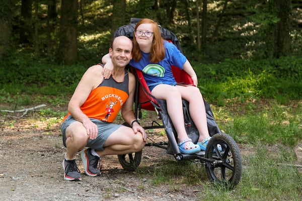 "I feel very, very grateful to have someone with a disability in my life," says David Glass. "Everyone needs a Darden in their life.” (Jason Getz / Jason.Getz@ajc.com)