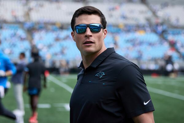 FILE - Former Carolina Panthers linebacker Luke Kuechly walks the sideline prior to an NFL Football game against the Los Angeles Chargers, Sep. 15, 2024, in Charlotte, N.C. (AP Photo/Brian Westerholt, File)