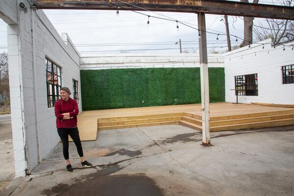 Amanda Kemery stands in the building that the city wants to demolish on Sylvan Road in Southwest Atlanta Friday, March 25, 2022.   STEVE SCHAEFER FOR THE ATLANTA JOURNAL-CONSTITUTION